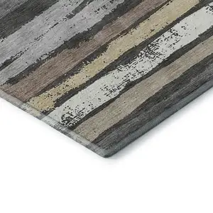 Photo of Charcoal Gray And Beige Striped Washable Area Rug With UV Protection