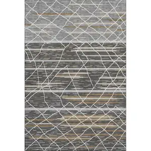 Photo of Charcoal Gray And Brown Striped Washable Area Rug With UV Protection