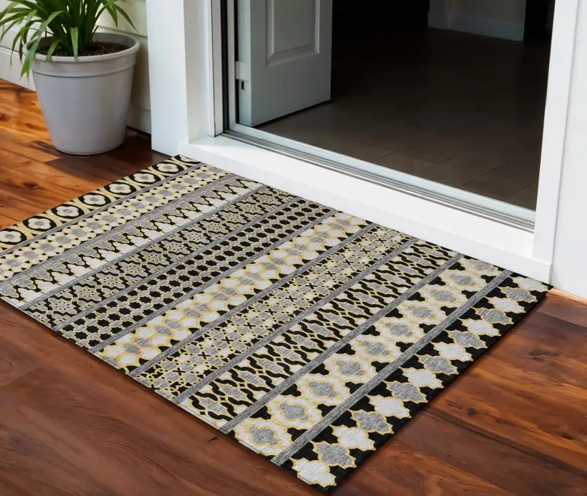 Charcoal Gray And Gold Quatrefoil Washable Indoor Outdoor Area Rug Photo 1