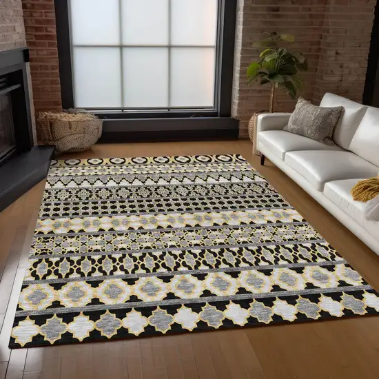 Charcoal Gray And Gold Quatrefoil Washable Indoor Outdoor Area Rug Photo 9