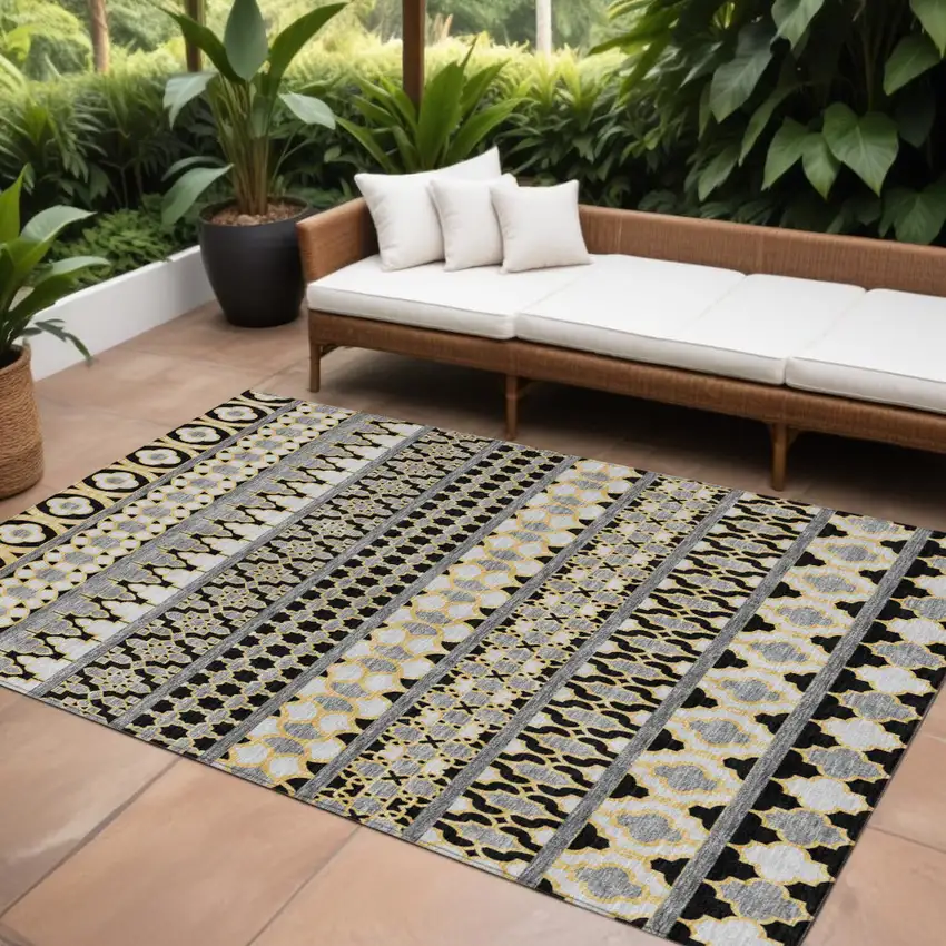 Charcoal Gray And Gold Quatrefoil Washable Indoor Outdoor Area Rug Photo 1