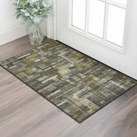 Charcoal Gray And Gold Striped Washable Area Rug With UV Protection Photo 2