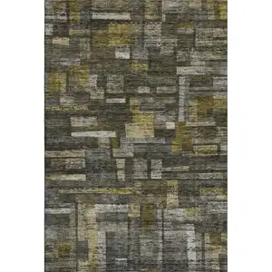 Photo of Charcoal Gray And Gold Striped Washable Area Rug With UV Protection