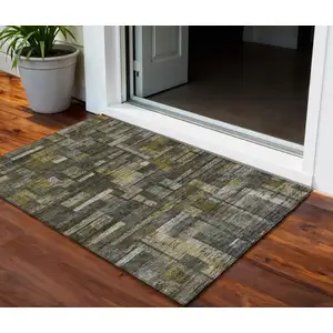 Photo of Charcoal Gray And Green Striped Washable Indoor Outdoor Area Rug