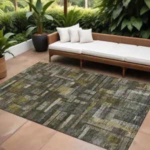 Photo of Charcoal Gray And Green Striped Washable Indoor Outdoor Area Rug
