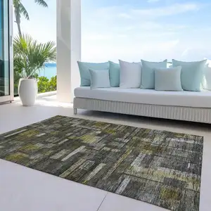 Photo of Charcoal Gray And Green Striped Washable Indoor Outdoor Area Rug