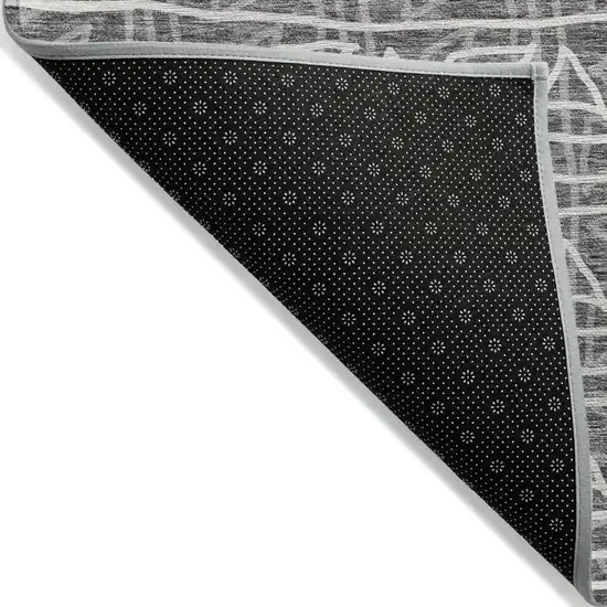 Charcoal Gray And Ivory Geometric Washable Indoor Outdoor Area Rug Photo 4