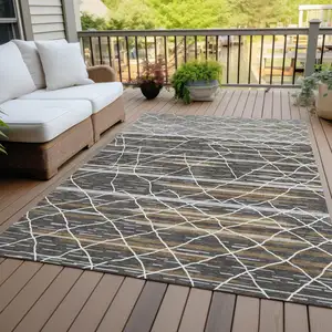 Photo of Charcoal Gray And Ivory Striped Washable Indoor Outdoor Area Rug