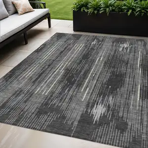 Photo of Charcoal Gray And Ivory Striped Washable Indoor Outdoor Area Rug
