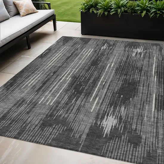 Charcoal Gray And Ivory Striped Washable Indoor Outdoor Area Rug Photo 1