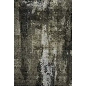 Photo of Charcoal Gray And Silver Abstract Washable Area Rug With UV Protection