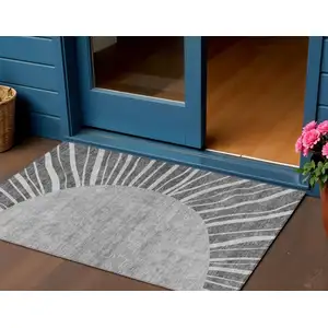 Photo of Charcoal Gray And Silver Abstract Washable Indoor Outdoor Area Rug