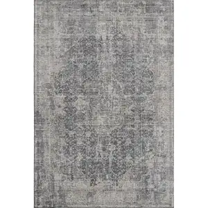 Photo of Charcoal Gray And Silver Floral Medallion Washable Area Rug With UV Protection