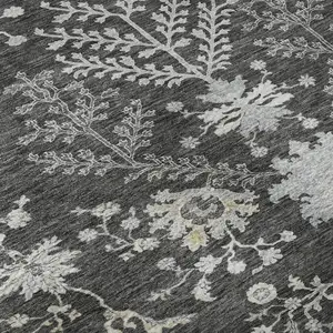 Photo of Charcoal Gray And Silver Floral Washable Area Rug With UV Protection