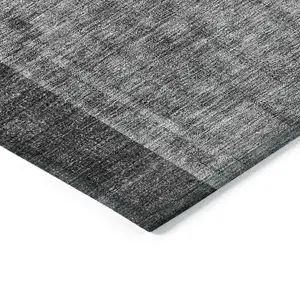Photo of Charcoal Gray And Silver Geometric Washable Indoor Outdoor Area Rug