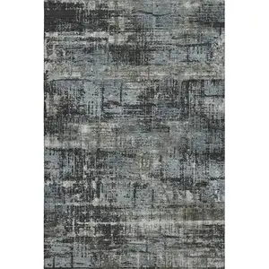 Photo of Charcoal Gray And Taupe Geometric Washable Area Rug With UV Protection