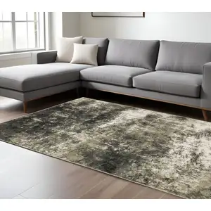 Photo of Charcoal Grey And Beige Abstract Power Loom Stain Resistant Area Rug