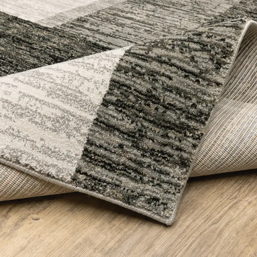 Charcoal Grey And Ivory Geometric Power Loom Stain Resistant Runner Rug Photo 8