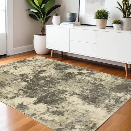 3' X 5' Charcoal Grey Beige And Tan Abstract Power Loom Stain Resistant Area Rug Photo 1