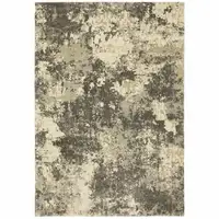 Photo of Charcoal Grey Beige And Tan Abstract Power Loom Stain Resistant Area Rug