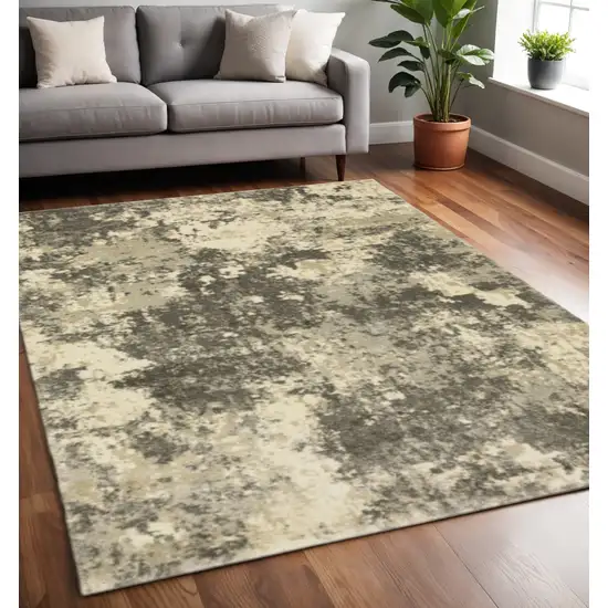 Charcoal Grey Beige And Tan Abstract Power Loom Stain Resistant Area Rug Photo 1