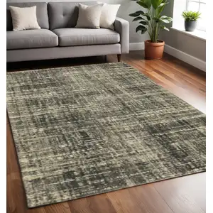 Photo of Charcoal Grey Beige And Tan Abstract Power Loom Stain Resistant Area Rug