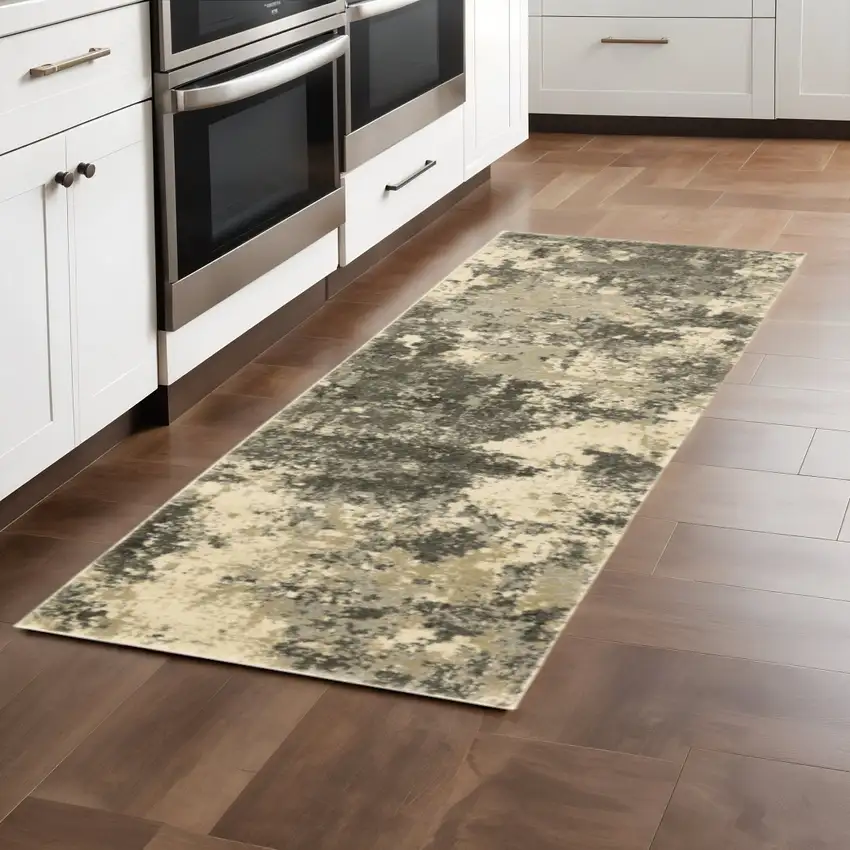 2' X 8' Charcoal Grey Beige And Tan Abstract Power Loom Stain Resistant Runner Rug Photo 1