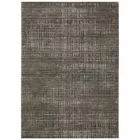 Photo of Charcoal Grey Grey Ivory Tan And Brown Abstract Power Loom Stain Resistant Area Rug