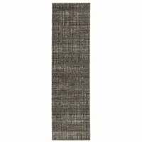 Photo of Charcoal Grey Grey Ivory Tan And Brown Abstract Power Loom Stain Resistant Runner Rug