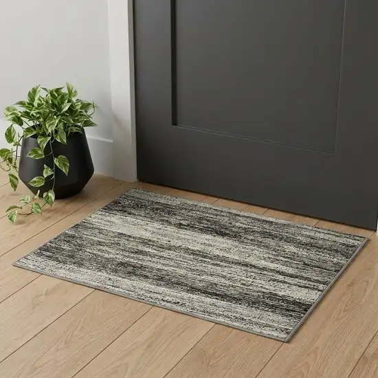 Gray and Ivory Abstract Power Loom Area Rug Photo 1