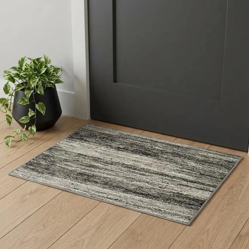Gray and Ivory Abstract Power Loom Area Rug Photo 1