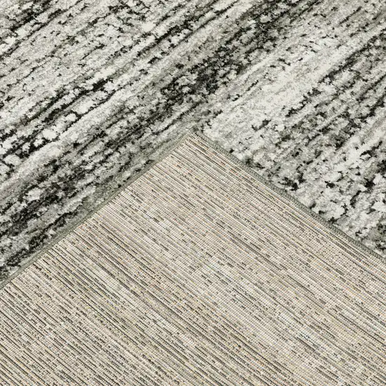 Charcoal Grey Silver And Ivory Abstract Power Loom Stain Resistant Area Rug Photo 9