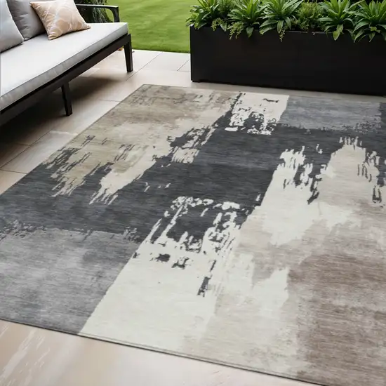 Charcoal Ivory And Beige Abstract Washable Indoor Outdoor Area Rug Photo 1