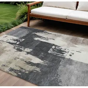 Photo of Charcoal Ivory And Beige Abstract Washable Indoor Outdoor Area Rug