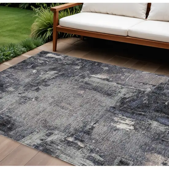 Charcoal Ivory And Blue Abstract Washable Indoor Outdoor Area Rug Photo 1