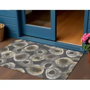 Photo of Charcoal Ivory And Copper Geometric Washable Indoor Outdoor Area Rug