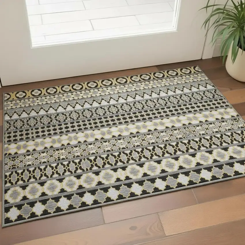 Charcoal Ivory And Copper Ikat Washable Area Rug With UV Protection Photo 2