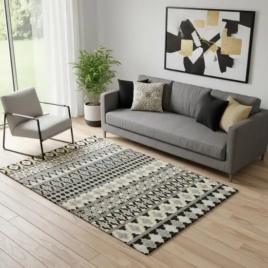 Charcoal Ivory And Copper Ikat Washable Area Rug With UV Protection Photo 1