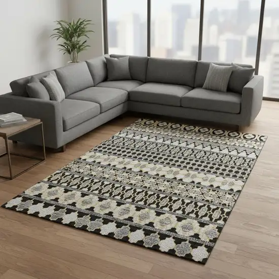 Charcoal Ivory And Copper Ikat Washable Area Rug With UV Protection Photo 2