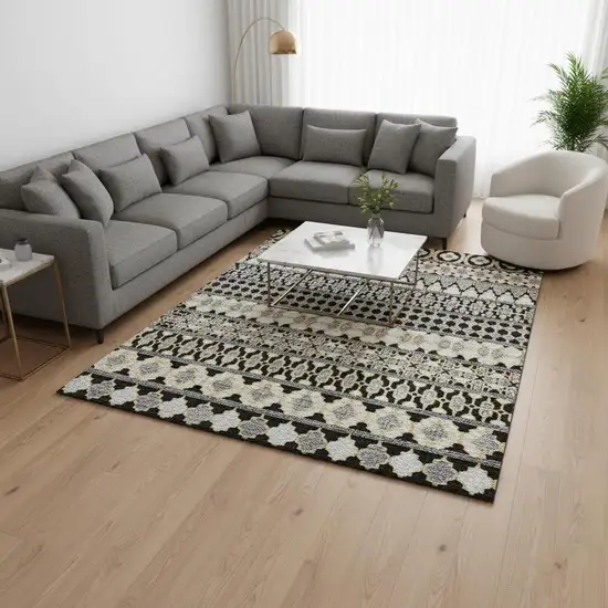 Charcoal Ivory And Copper Ikat Washable Area Rug With UV Protection Photo 2