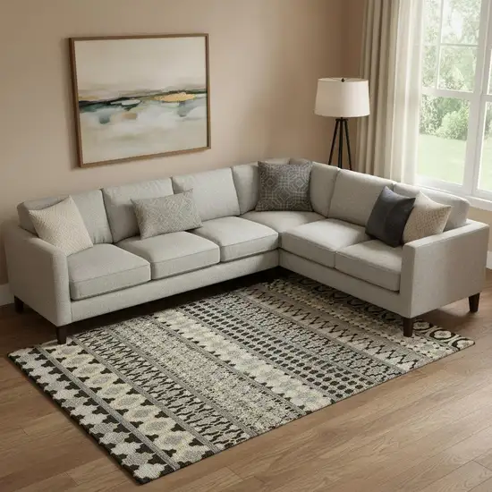 Charcoal Ivory And Copper Ikat Washable Area Rug With UV Protection Photo 1