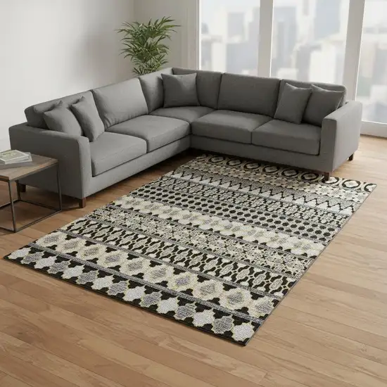 Charcoal Ivory And Copper Ikat Washable Area Rug With UV Protection Photo 2