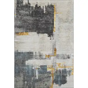 Photo of Charcoal Ivory And Gold Abstract Washable Area Rug With UV Protection
