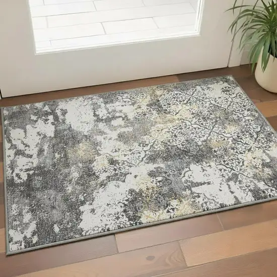 Charcoal Ivory And Gold Abstract Washable Area Rug With UV Protection Photo 2