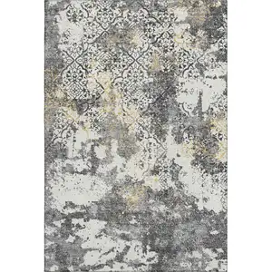 Photo of Charcoal Ivory And Gold Abstract Washable Area Rug With UV Protection