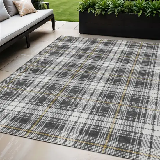 Charcoal Ivory And Gold Plaid Washable Indoor Outdoor Area Rug Photo 1