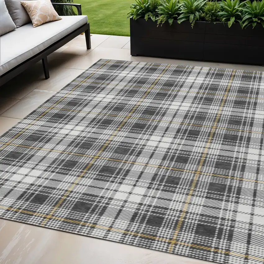 Charcoal Ivory And Gold Plaid Washable Indoor Outdoor Area Rug Photo 1