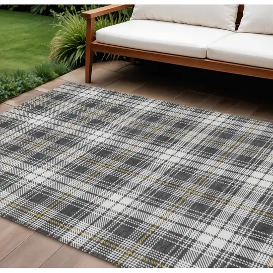 Charcoal Ivory And Gold Plaid Washable Indoor Outdoor Area Rug Photo 1