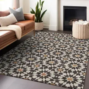 Photo of Charcoal Silver And Copper Geometric Washable Area Rug With UV Protection
