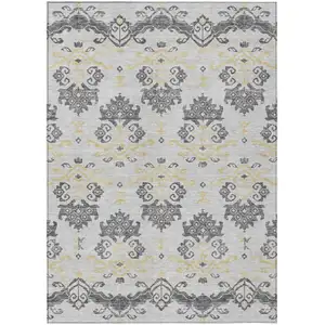 Photo of Charcoal Silver And Gold Oriental Washable Indoor Outdoor Area Rug